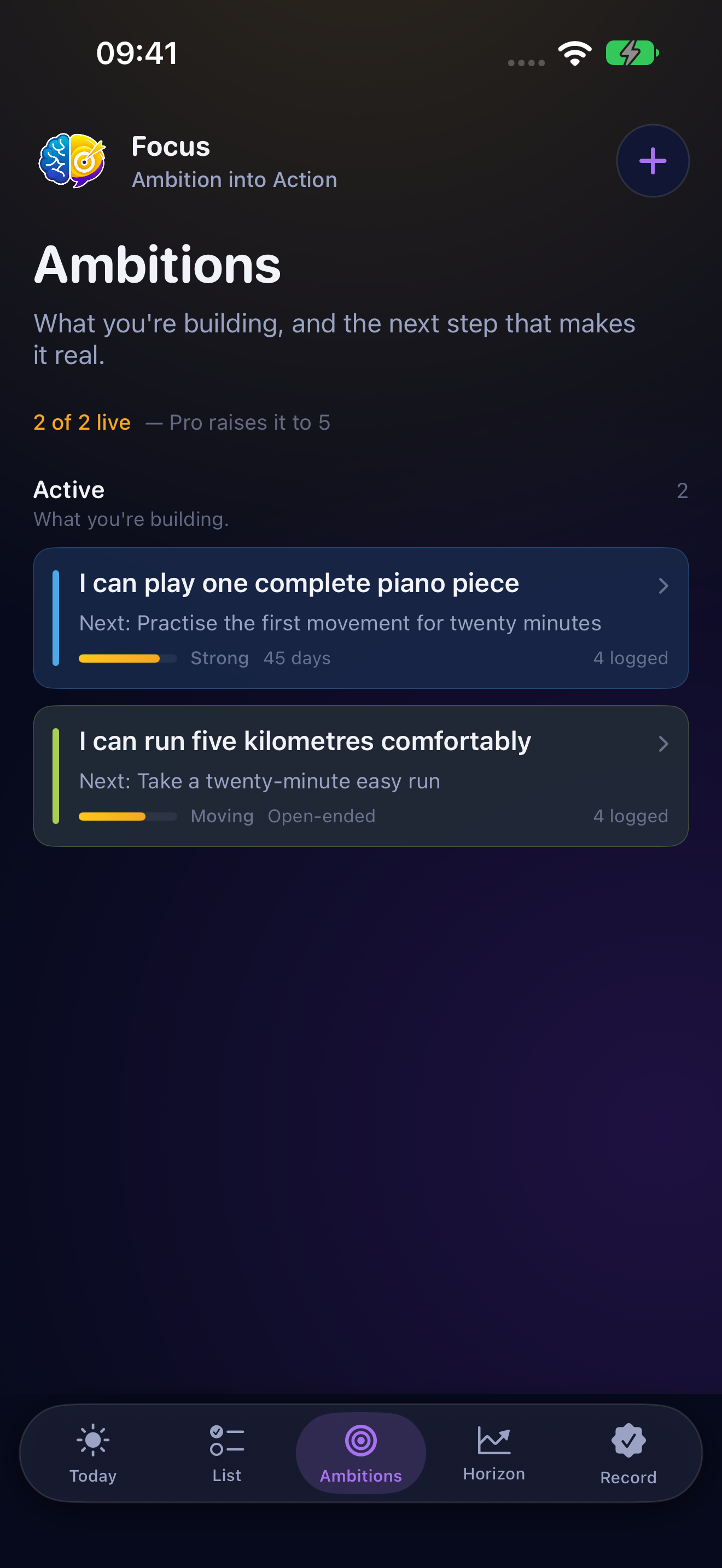 Focus Ambitions on iPhone, dark appearance. Illustrative app entries.